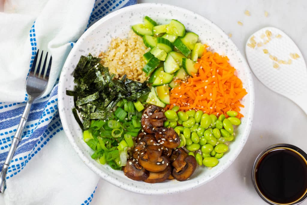 Vegan Customizable Sushi Bowls with many toppings and coconut aminos