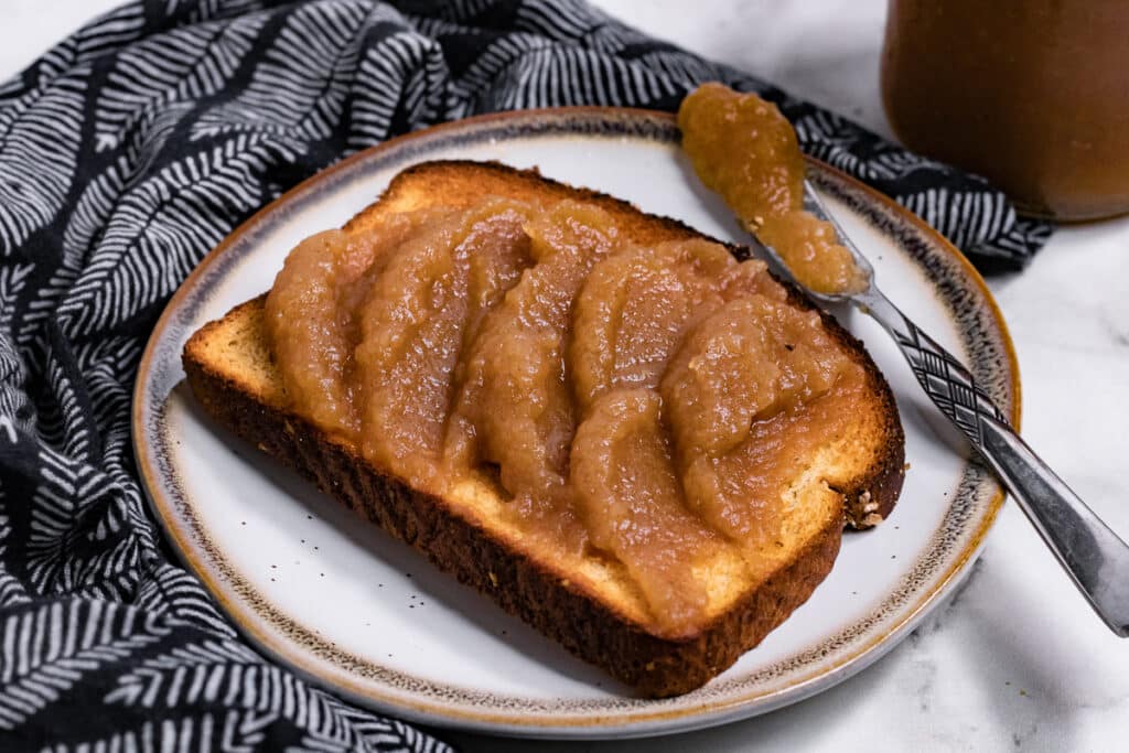 Vegan instant pot apple butter on a slice of toast