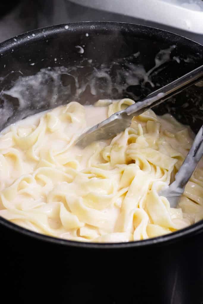 Pasta in a pot with coconut sauce
