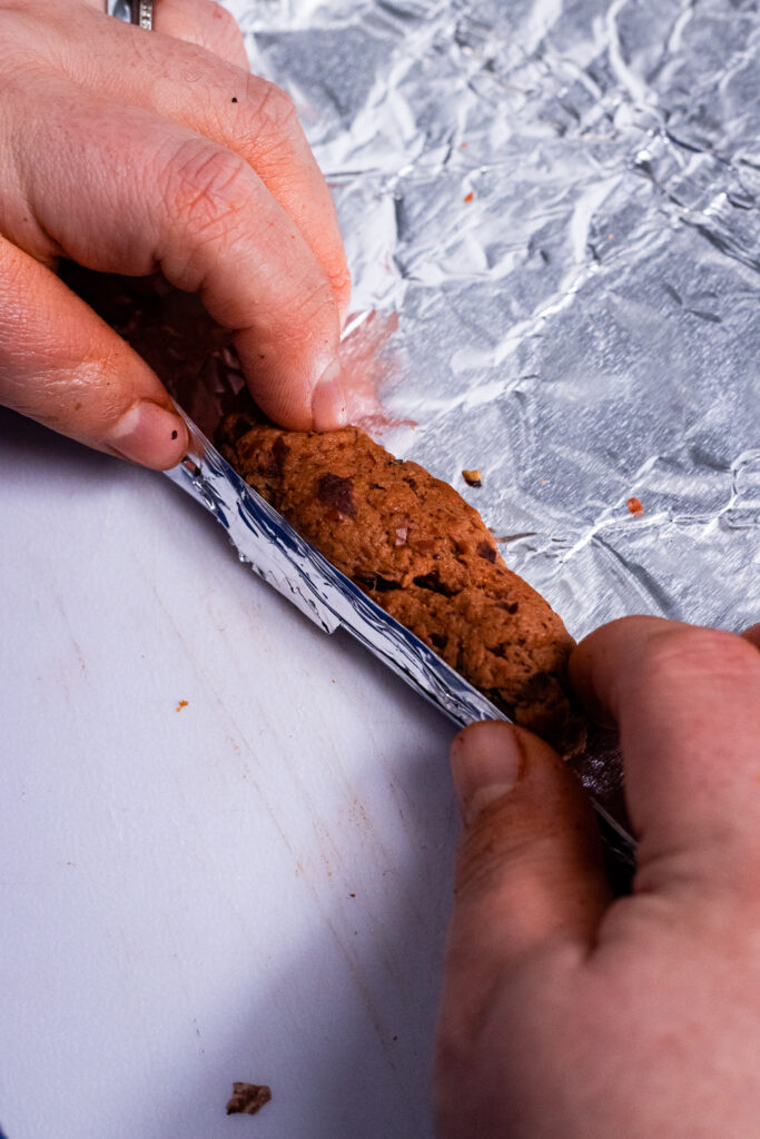 Rolling the dough into tin foil