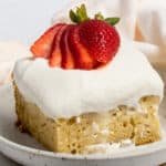A square of Vegan Tres Leches cake on a plate
