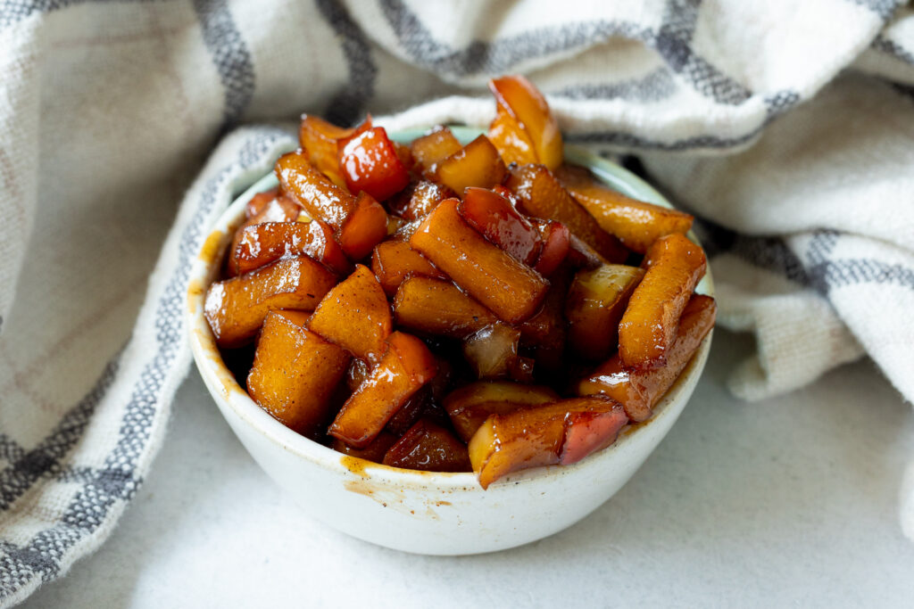 Caramelized apples in a small bowl