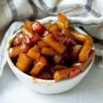 Caramelized apples in a small bowl